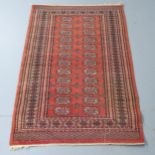 A red-ground Bokhara rug. 150x98cm