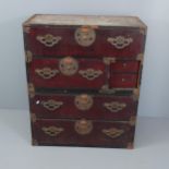 A late 20th century Japanese two-section Tansu chest. 88x105x45cm. Heavily surface marked and