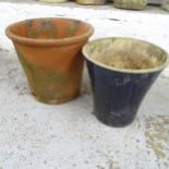 A terracotta garden planter (A/F), 54x49cm, and another glazed ceramic planter, 44x45cm. (2)