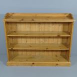 A modern pine open bookcase with two fixed shelves. 120x95x28cm