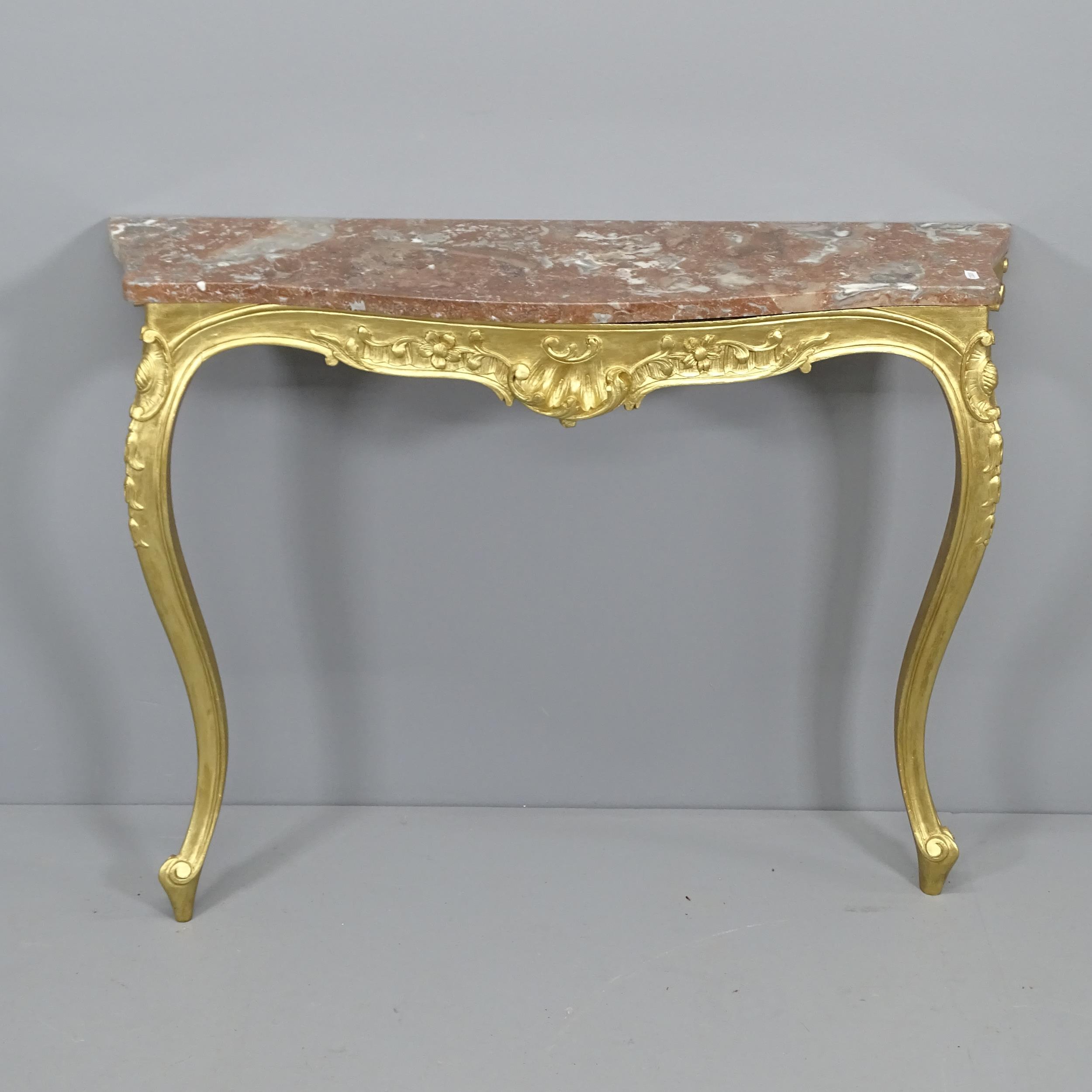 A continental gilt-painted and marble topped console table of serpentine form. 98x76x29cm