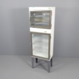 A vintage Japanese two door medical specimen cabinet. 46x143x29cm requires re-wiring.