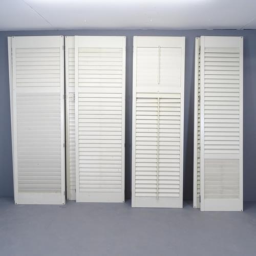 Four pairs of modern internal shutters, plus one spare, with frames. Three pairs at 61x204cm,