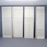 Four pairs of modern internal shutters, plus one spare, with frames. Three pairs at 61x204cm,