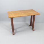An early 20th century oak Gothic side table. 104x75x56cm