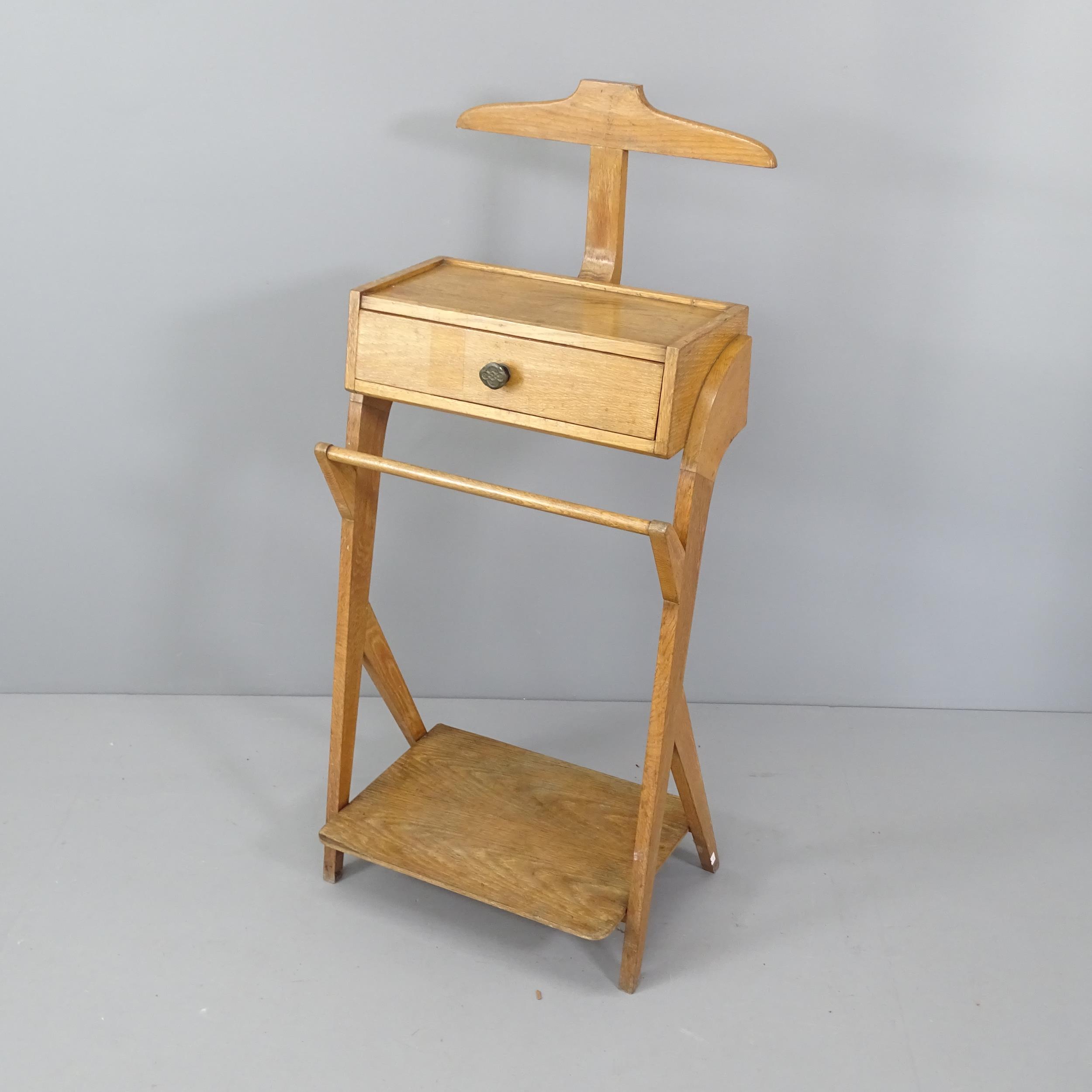 A mid-century stained oak valet stand with drawer. Height 110cm