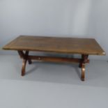A late 20th century oak trestle dining table. 194x75x87cm