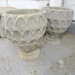 A pair of two-section garden urns. 40x18cm.