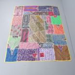 A patchwork wall hanging. 194x144cm.