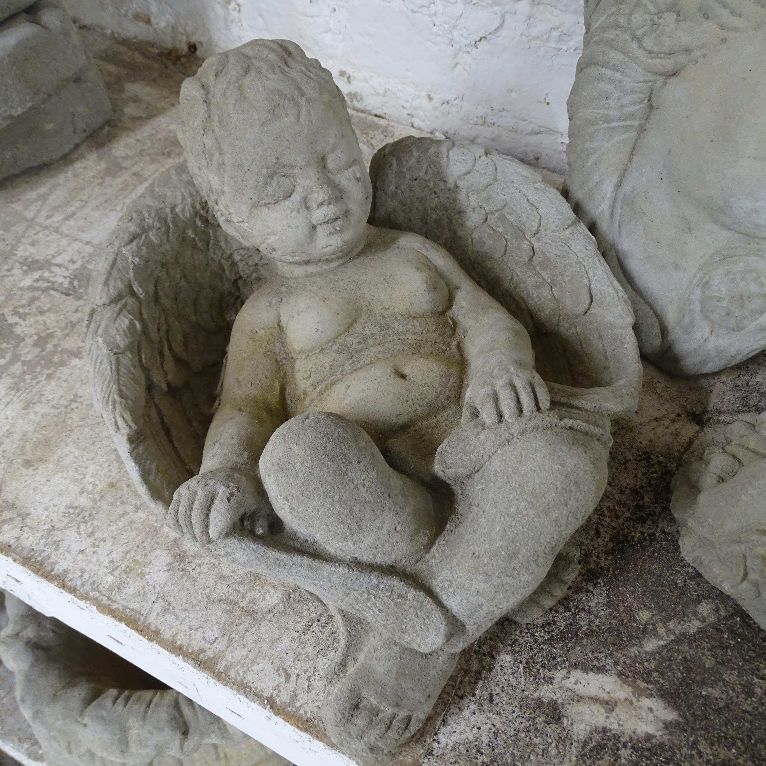 Four various concrete garden ornaments including a Baccus cherub, length 26cm, A wall plaque in - Image 2 of 2