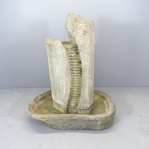 A resin stone-effect garden water fountain. 100x125x70cm.