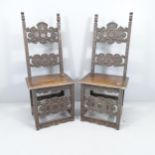 A pair of carved oak renaissance style hall chairs.
