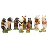 BESWICK - 9-piece pig band, largest height 13cm Trumpet detached but still present, French horn