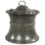 A 1920s Arts and Crafts style planished pewter biscuit barrel, by Cooper Brothers, stamped to base
