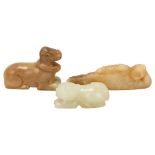 3 Chinese jade carvings, comprising a reclining figure (length 8cm), a mythical creature, and a