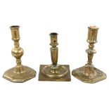 A 17th/18th century Spanish bronze candlestick, together with 2 others, tallest 17cm Spanish stick