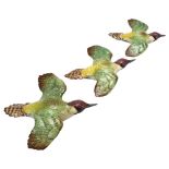 Graduated set of 3 Beswick green woodpecker wall ornaments, pattern no. 1344, largest length 19cm