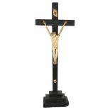 A 19th century bone carved crucifix on ebonised cross, height 48cm