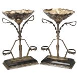 A pair of Art Deco electroplate table centre comports, height 35cm General light wear