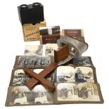 A Victorian stereoscopic slide viewer, collection of stereoscopic cards, and a small French