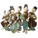 A group of 5 Indian carved and painted wood wall-hanging musician figures, early to mid-20th