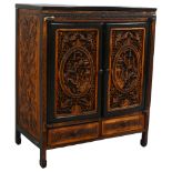 An early 20th century Chinese table-top cabinet, with relief carved panels, ebonised pine