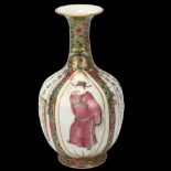 A Chinese famille rose porcelain narrow-necked vase, with painted enamel panels and text, height