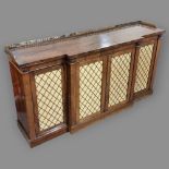 A Regency rosewood break-front 4-door side cabinet, with cast-brass gallery, brass lattice