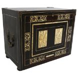 An 18th century Italian ebonised table-top cabinet with ivory engraved panels of Classical form,
