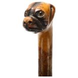 A carved wood Bulldog's head handled walking stick with glass eyes, early 20th century, length