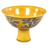 A yellow Chinese stem bowl with blue under-glaze decoration, character marks inside base, height