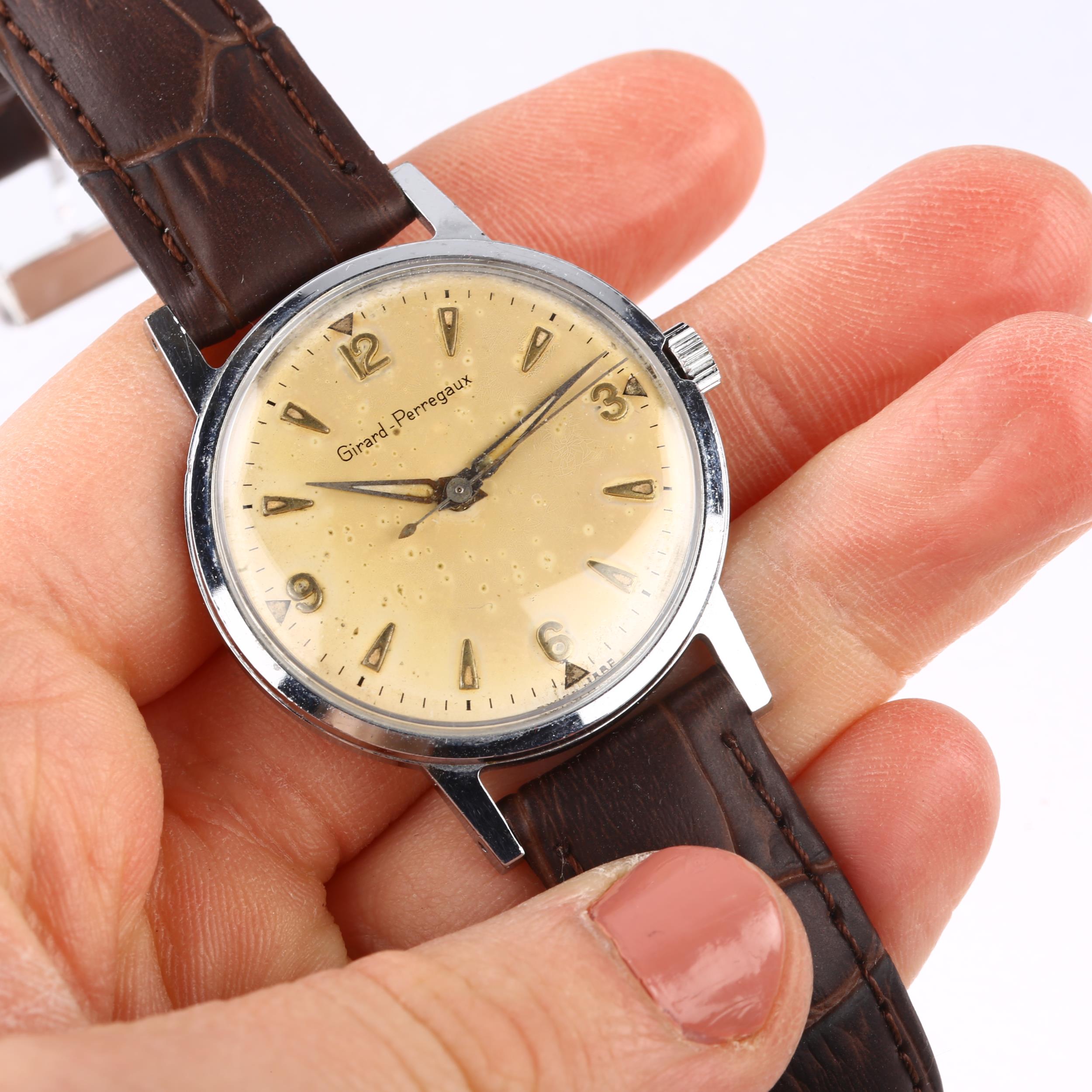 GIRARD-PERREGAUX - a Vintage stainless steel mechanical wristwatch, silvered dial with gilt - Image 5 of 5