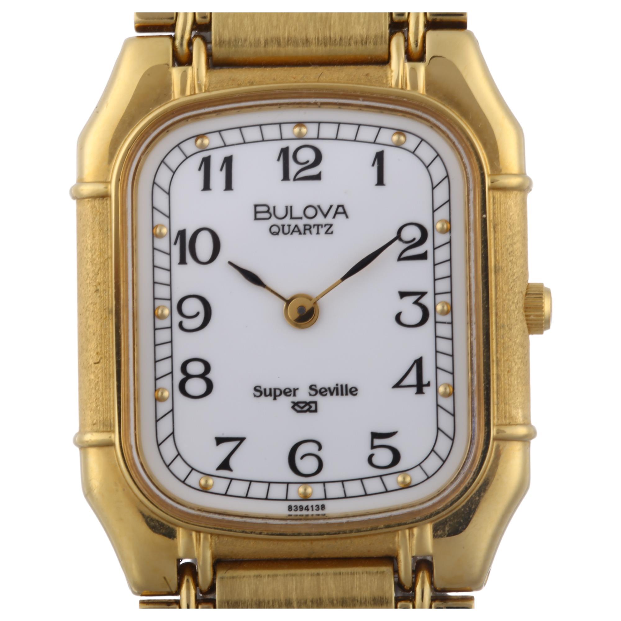 BULOVA - a gold plated stainless steel Super Seville quartz bracelet watch, white dial with Arabic