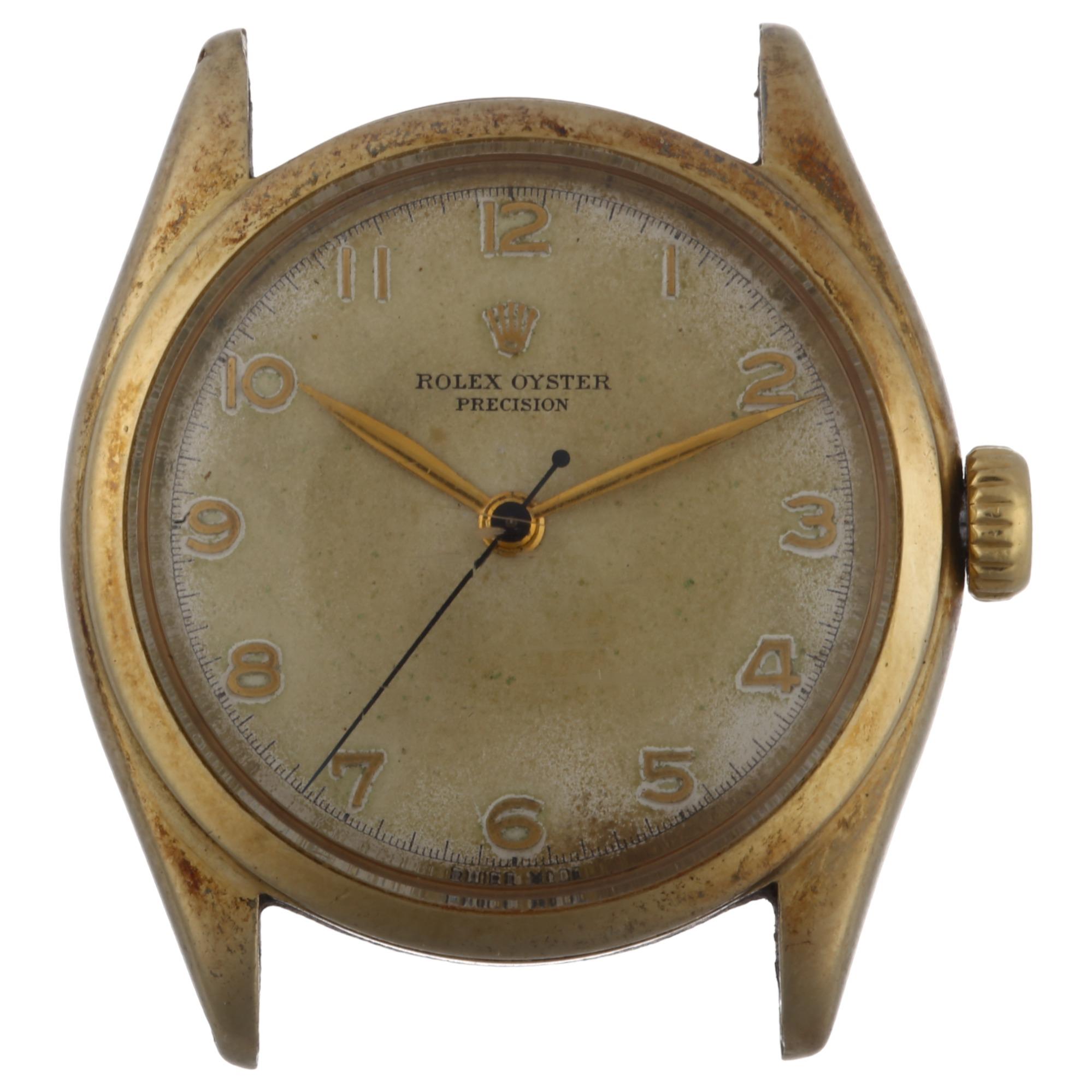 ROLEX - a 10K gold Oyster Precision mechanical wristwatch head, ref. 6022, circa 1952, silvered dial