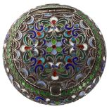 A Russian silver and champleve enamel circular pillbox, allover floral wirework decoration with gilt