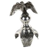 JUDAICA - an early 20th century silver rimonim/Torah scroll finial, with eagle knop and relief