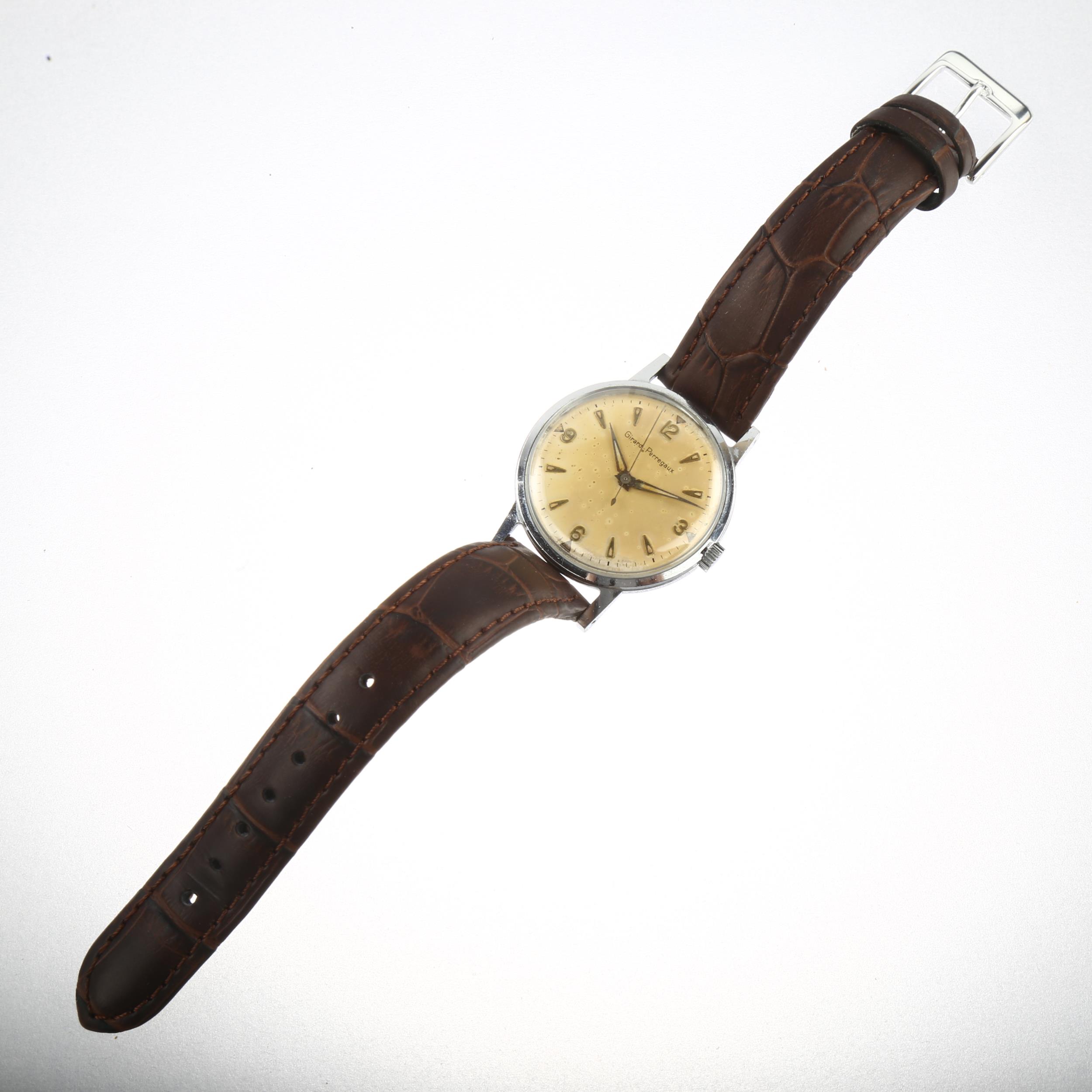 GIRARD-PERREGAUX - a Vintage stainless steel mechanical wristwatch, silvered dial with gilt - Image 2 of 5