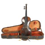 A Victorian violin, with carved lionhead scroll, and horsehair bow, in hardshell case, violin is