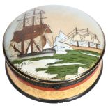A large circular porcelain box and cover, with printed ship design and gilded decoration, diameter