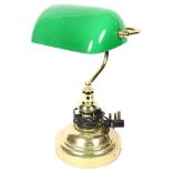 An adjustable brass desk lamp, with green glass shade, height 38cm