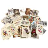 A tin of mixed postcards, Kensitas silks, tea cards, First World War silks etc