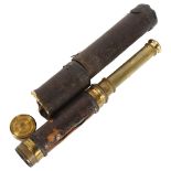 A 19th century leather-covered brass 3-draw telescope, with dust cap marked LG Wood of London,