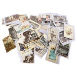 A collection of 20th century and later postcards, including humorous, topographical, greetings cards