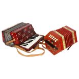 SCHOLER - a 1940s model no. 502 floral German concertina accordion, and a mini piano accordion, with