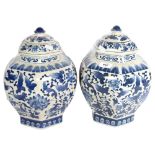 A pair of Chinese blue and white crackle glaze jars and covers, height 32cm