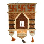Don Freedman (American) Folk Art fibre and woolwork Tibetan style wall hanging with bell, 65cm