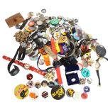 A collection of Vintage badges, wristwatches, penknife etc