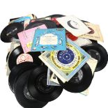 A quantity of vinyl 7" records (both loose and within sleeves), including various genres, and many