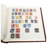 2 world wide stamp albums, 1 containing Argentinian stamps and stamps from Chile, the other