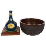 Old Parr Scotch Whisky, with a carved hardwood bowl with design of elephants, 28cm diameter